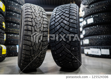 Comparison of old and new studded car tires. Comparison of old and new studded car tires. 125524306