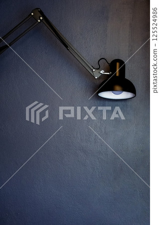 lamp on on dark blue wall background 125524986