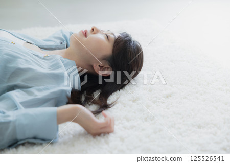 A lying young lady A lying young lady 125526541