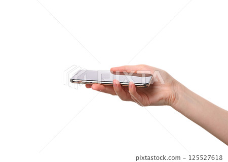 A person is holding a smartphone with a clean, modern look, isolated on white 125527618