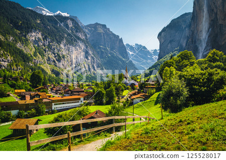 Picturesque waterfall and famous village in the Lauterbrunnen valley, Switzerland 125528017