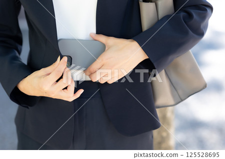 Smartphone at hand Smartphone at hand 125528695