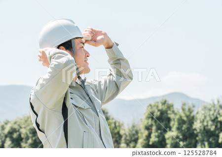 Forestry / Environmental protection / Men in work clothes at construction sites Forestry / Environmental protection / Men in work clothes at construction sites 125528784