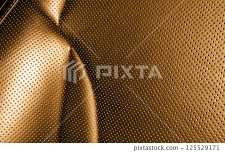 Modern luxury car brown leather interior. Part of orange leather car seat details with white stitching. Interior of prestige car. Comfortable perforated leather seats. Perforated leather. Modern luxury car brown leather interior. Part of orange leather car seat details with white stitching. Interior of prestige car. Comfortable perforated leather seats. Perforated leather. 125529171