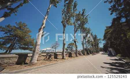 Waterfront in Feodosia in the summer. Waterfront in Feodosia in the summer. 125529243