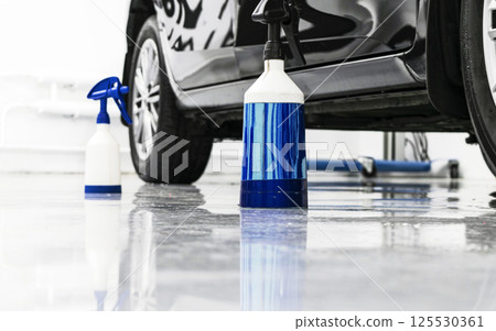 Cars in a carwash. Car wash with foam in car wash station. Carwash. Washing machine at the station. Car washing concept. Car detailing Cars in a carwash. Car wash with foam in car wash station. Carwash. Washing machine at the station. Car washing concept. Car detailing 125530361