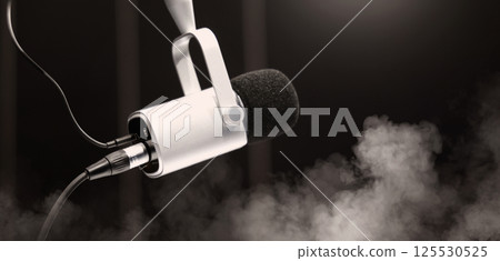 Microphone in studio. Professional studio microphone with a pop filter is suspended boom arm and studio lights. Set up mic for podcast voice over or recording high quality sound audio in a controlled. Microphone in studio. Professional studio microphone with a pop filter is suspended boom arm and studio lights. Set up mic for podcast voice over or recording high quality sound audio in a controlled. 125530525