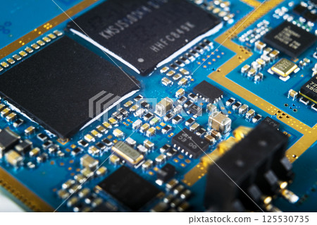 Macro shot of Circuit board with resistors microchips and electronic components. Computer hardware technology. Integrated communication processor. Information engineering. Semiconductor. PCB. Closeup 125530735