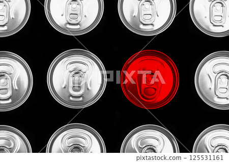 Close up photo of aluminium one red can in a raw. Aluminium can background. Can Pattern. Aluminium beverage cans. Drink can. Metal containers for packaging drinks. Black and white 125531161