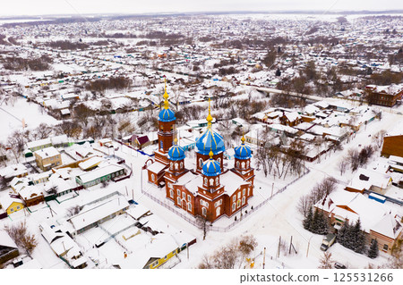 Snow covered Petrovsk cityscape with Church of Intercession of Holy Virgin in winter Snow covered Petrovsk cityscape with Church of Intercession of Holy Virgin in winter 125531266