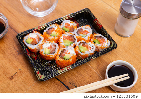 California roll masago caviar with cheese avocado and salmon California roll masago caviar with cheese avocado and salmon 125531509