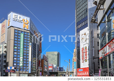 City Street with Modern Buildings and Vibrant Signage, Tokyo Dec 10 2024 125531853