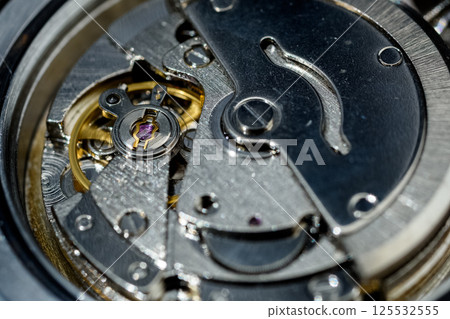 Precision machinery: inside a wristwatch Precision machinery: inside a wristwatch 125532555