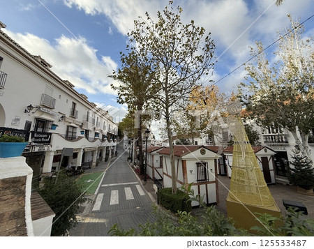 Streets of the white village of Mijas in Spain 125533487