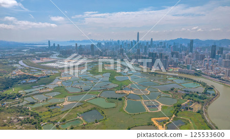Shenzhen River flowing view on April 20, 2025 Shenzhen River flowing view on April 20, 2025 125533600