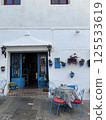 Streets of the white village of Mijas in Spain 125533619
