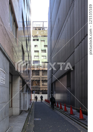Between Buildings with People Strolling and Modern Architecture, Japan Dec 10 2024 Between Buildings with People Strolling and Modern Architecture, Japan Dec 10 2024 125535589