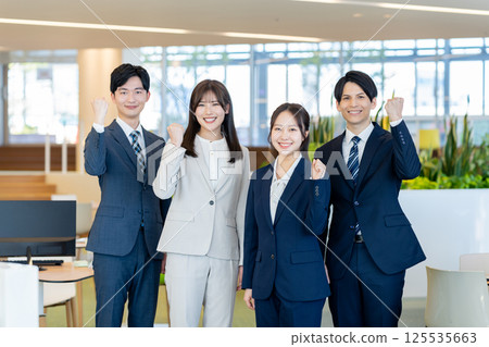 New employees working in an office. Photo courtesy of Denpa Gakuen, Tokyo Electronics College. New employees working in an office. Photo courtesy of Denpa Gakuen, Tokyo Electronics College. 125535663