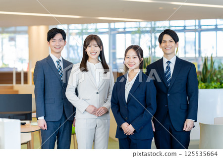 New employees working in an office. Photo courtesy of Denpa Gakuen, Tokyo Electronics College. New employees working in an office. Photo courtesy of Denpa Gakuen, Tokyo Electronics College. 125535664