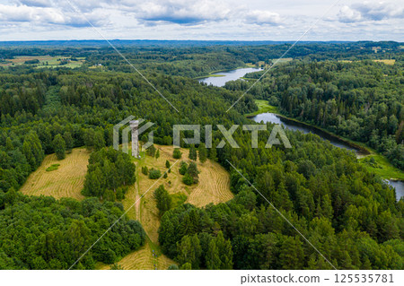 Wooden observation tower in Paganamaa, Rouge Parish, Estonia, aerial view Wooden observation tower in Paganamaa, Rouge Parish, Estonia, aerial view 125535781