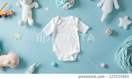 Baby white body suit on blue background with toys around. Cozy mockup, flat lay, top view 125535993