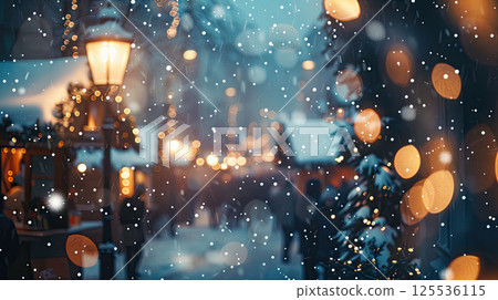 Christmas market covered in fresh snow. Festive lights glowing and people in warm clothes in cozy atmosphere 125536115