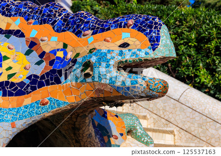 Multicolored mosaic dragon salamander of Gaudi in Park Guell, Barcelona, Spain Multicolored mosaic dragon salamander of Gaudi in Park Guell, Barcelona, Spain 125537163
