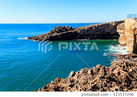 Boca do Inferno (Hell's Mouth) is a unique rock formation on the edge of the ocean in Cascais, Portugal 125537200