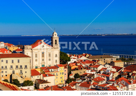 View of Alfama, the oldest neighborhood of Lisbon, from Santa Luzia viewpoint in Lisbon, Portugal 125537218