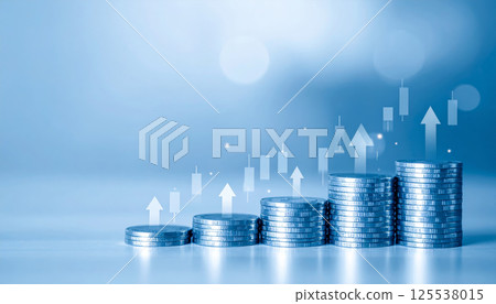 Stacks of silver coins with upward arrows and stock market charts, symbolizing financial growth and investment opportunities. image conveys sense of prosperity and success Stacks of silver coins with upward arrows and stock market charts, symbolizing financial growth and investment opportunities. image conveys sense of prosperity and success 125538015
