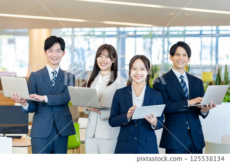 Businessmen working in an office. Photo courtesy of Denpa Gakuen, Tokyo Electronics College. Businessmen working in an office. Photo courtesy of Denpa Gakuen, Tokyo Electronics College. 125538134