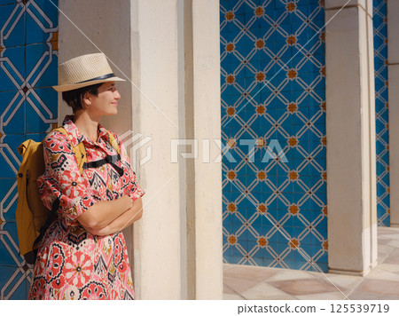 Young female tourist exploring iconic landmarks of the United Arab Emirates. 125539719