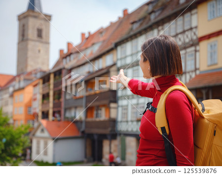 Tourist woman explores beautiful city of Erfurt, Tourist woman explores beautiful city of Erfurt, 125539876