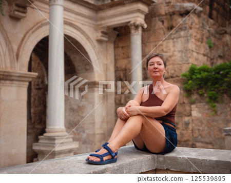 Woman walking narrow streets of old town Antalya Turkey 125539895