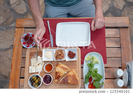 Traditional Turkish breakfast in garden near home Traditional Turkish breakfast in garden near home 125540101