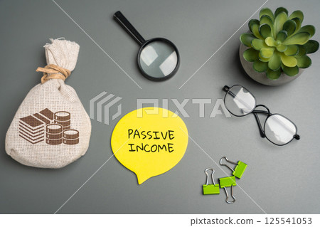 Passive income concept. Type of income that is acquired with little to no labor to earn or maintain. Message and money bag. Business and finance 125541053