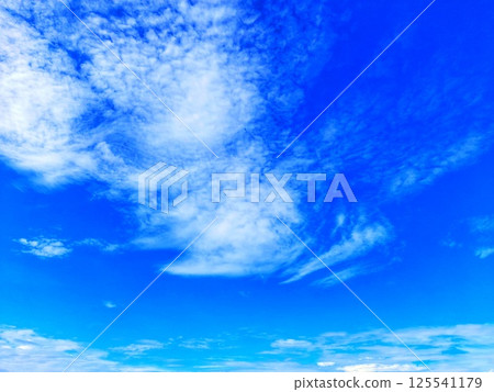 Bright clouds in the sky with a blurred background Bright clouds in the sky with a blurred background 125541179