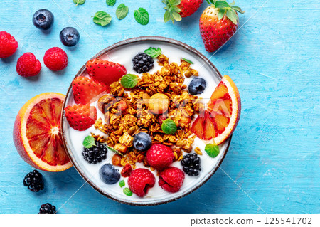 Granola with yogurt and fresh fruit. Organic gourmet muesli, overhead 125541702