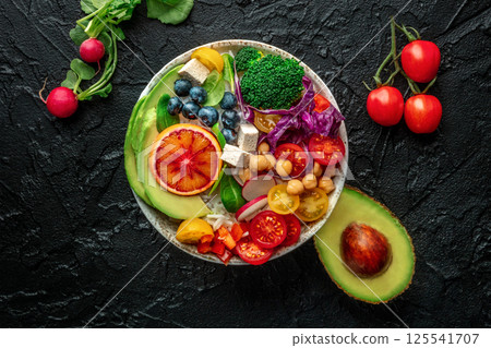 Buddha Bowl. Rainbow salad. Vegan poke bowl with avocado. Healthy food 125541707