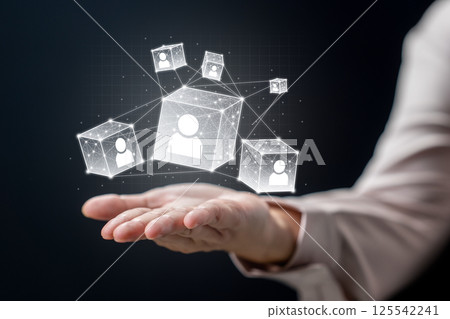 Businesswoman showing icon of human representing potential candidates on the wireframe cubes. Technology innovation on a virtual screen. Concept of human resources recruitment and hiring 125542241