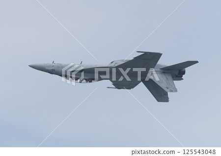 A US Navy F/A-18F Super Hornet performing a demonstration flight at the Iwakuni Air Base Air Show A US Navy F/A-18F Super Hornet performing a demonstration flight at the Iwakuni Air Base Air Show 125543048