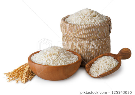 long rice in burlap sack, bowl and scoop with ears isolated on white background long rice in burlap sack, bowl and scoop with ears isolated on white background 125543050