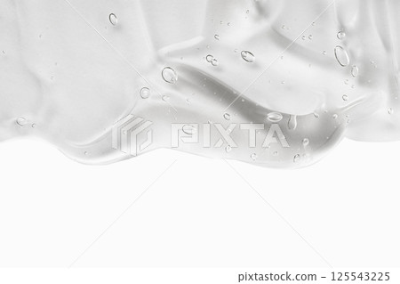 Hyaluron acid for skin care with collagen and retinol. Skincare lotion face serum swatch. Gel smudge isolated on white background. Cosmetic cream transparent liquid gel. Hyaluron acid for skin care with collagen and retinol. Skincare lotion face serum swatch. Gel smudge isolated on white background. Cosmetic cream transparent liquid gel. 125543225
