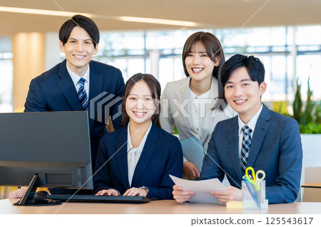 Businessmen working in an office. Photo courtesy of Denpa Gakuen, Tokyo Electronics College. Businessmen working in an office. Photo courtesy of Denpa Gakuen, Tokyo Electronics College. 125543617