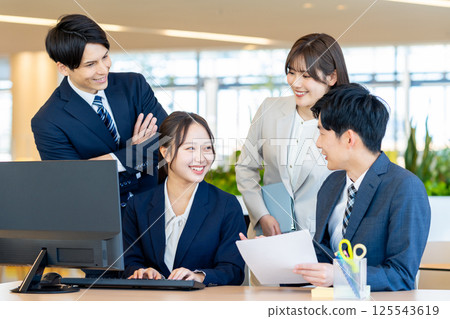 Businessmen working in an office. Photo courtesy of Denpa Gakuen, Tokyo Electronics College. Businessmen working in an office. Photo courtesy of Denpa Gakuen, Tokyo Electronics College. 125543619