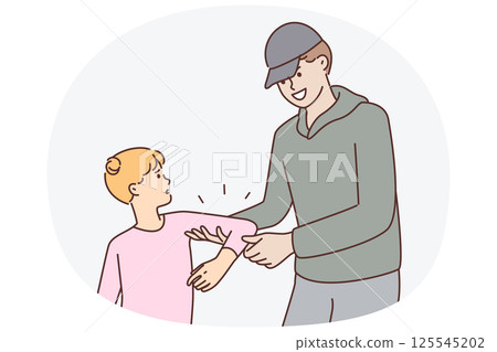 Smiling man trying to kidnap resisting teenage girl or commit kidnapping and child abuse 125545202