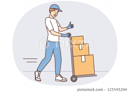 Man at warehouse worker carries cargo cart with cardboard boxes and shows thumbs up 125545204