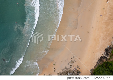 Top view beach beautiful sea nature background,Amazing waves sand sea background Top view beach beautiful sea nature background,Amazing waves sand sea background 125546956