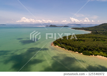 Top view seashore waves nature background,Amazing waves crashing on rocks seascape view 125546972
