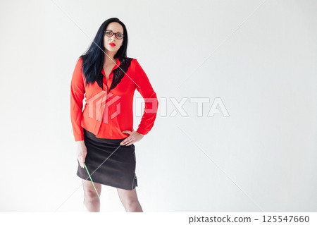 Teacher in red business suit with pointer on white background 125547660
